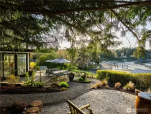 The side yard with a calming water feature is an incredible space to take in the setting sun.