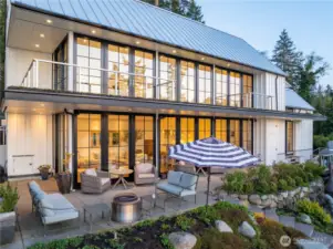 Walls of Pella Glass doors and windows allow for seamless indoor/outdoor living, a real connection with nature.