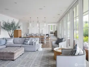 The home is awash is natural light. View from the patio door back to the kitchen.