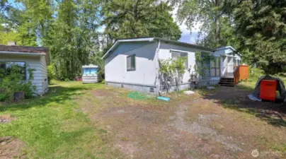 All structures on lot stay but sold with value in the land as-is.