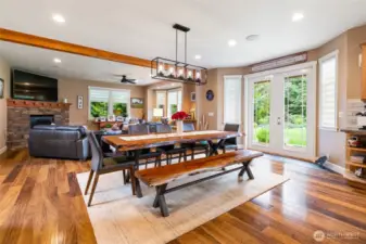 Plenty of room for a large dining table. French door lead to beautiful Tiger Wood wrap around porch.