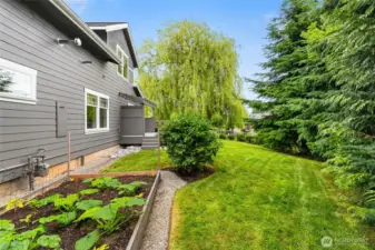 Raised garden bed of the fully fenced ADU backyard