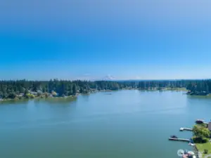 Unobstructed views of Mt.Rainier on a clear day and expansive views of the Lake, 2 major reasons why the sellers purchased this property yearsss aho.