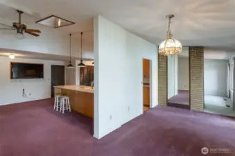 Another view of the kitchen/dining/main living layout.