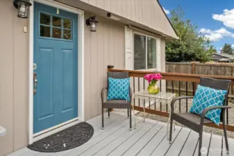Whether you are inviting guests inside or enjoying your yard, the front deck is a perfect spot!