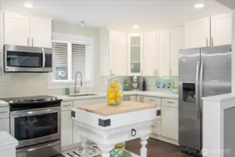 Your kitchen is light and bright, ready for your culinary creativity.