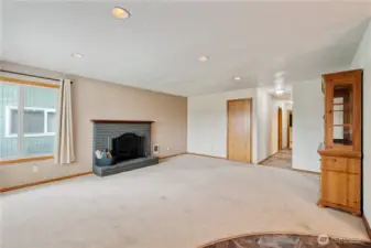 Living room with wood burning fireplace