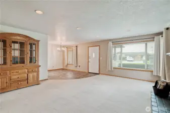 Recessed lighting and large windows let plenty of natural light in