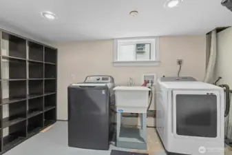 Lower lever utility room. Spacious with lots of storage options.