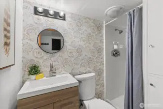 Bathroom with shower in the lower level apartment.