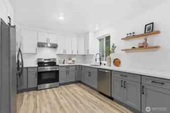 Quartz counters, shaker cabinets, soft close drawers and all new SS appliances!