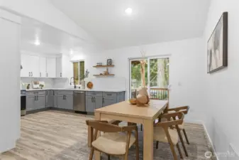 The kitchen is open to the dining area.