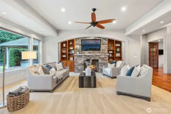 Custom Built ins Flank the Fireplace w/ Basalt Mantle & Granite Hearth!