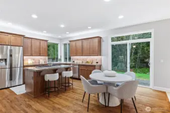 Dining nook with access to the backyard makes alfresco dining easy!