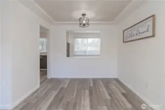 Dining room nook, updated lighting really showing the features of the 1950's character of the home