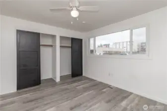 Primary bedroom with two closets for lots of storage and space!
