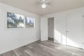 2nd bedroom, ceiling fan and view of the back yard!