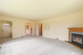 Looking back toward the entry you see the arched passageway to the formal dining room.