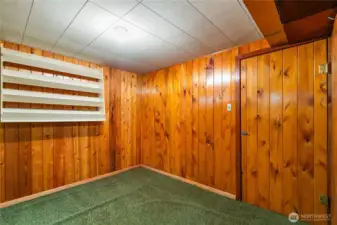 At the bottom of the stairs.