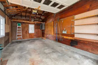 The garage has some storage and plenty of room for most standard autos... Or maybe use your imagination...