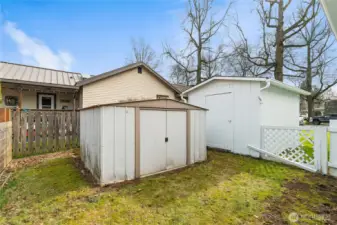 Tucked away behind the garage are two storage buildings for your outside yard storage and maybe a place for your hobbies.