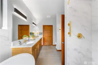 Owner's suite bathroom with walk-in closet.