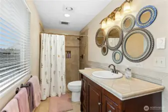 Primary 3/4 bath with heated floors.