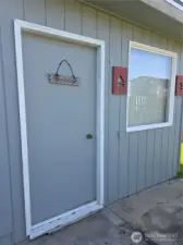 Door leading to Bunk House off back patio.