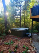 Private hot tub area just outside of the family room downstairs.