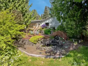 Side of house that leads to stairs to private beach