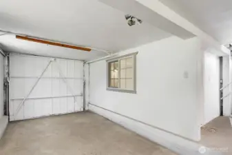 Garage will accommodate a small car. Would also be ideal as a workshop or storage area.