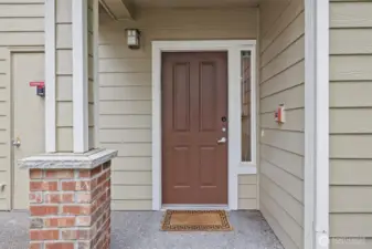 Front entry to this updated 2 bedroom, 2 bath home with 1,078 sq. ft. interior.