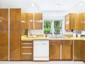 White appliances and wood cabinets.