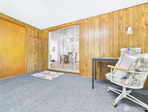The "sunroom" addition has a sliding door into the rest of the house.