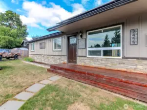 Modern accents to the exterior entrance.