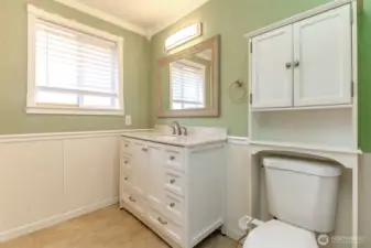 Updated bathroom with Modern vanity and updated fixtures.