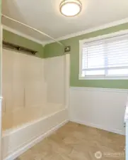 Nice one piece bath tub.