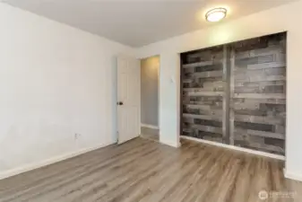 Closet with Wood accents.