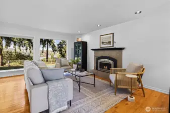 Front family room with gas burning fireplace and views!