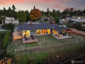 Backyard with multiple entertaining areas and terraced yard ready for your vision - gardening, dog run, endless possibilities!