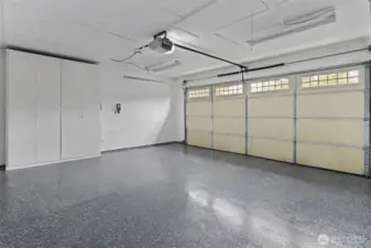 2 car garage with storage and new epoxy flooring