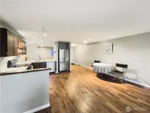 Wide open kitchen. Plenty of room to put a dining table and chairs.