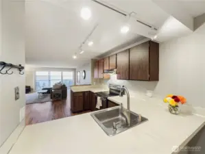 Open concept again with views from the office area, through the kitchen, to the bay!