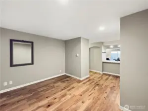 Looking back into kitchen area from the large open office