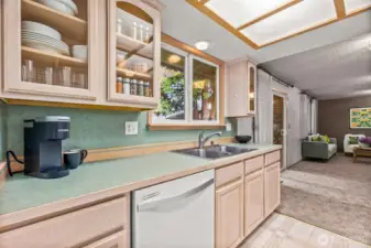 View from kitchen into the family room. (staged)