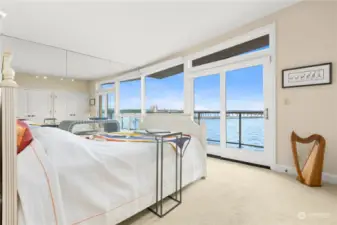 Primary bedroom with its own private balcony.