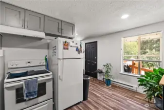 Unit F kitchen looking back at dining nook