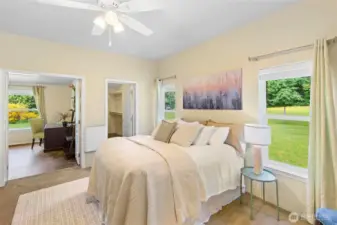 Primary bedroom with the bonus room and closet in the background.
