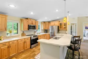 Open kitchen with tons of storage.