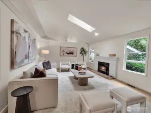 Spacious living area with open entry and natural light